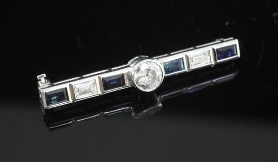 A white gold, sapphire and diamond bar brooch, 1.5in.